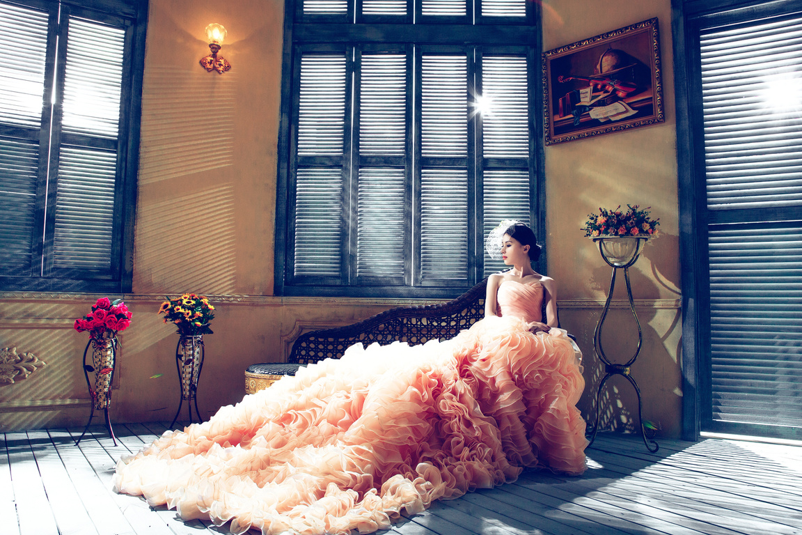 Woman in an Elegant Peach Dress