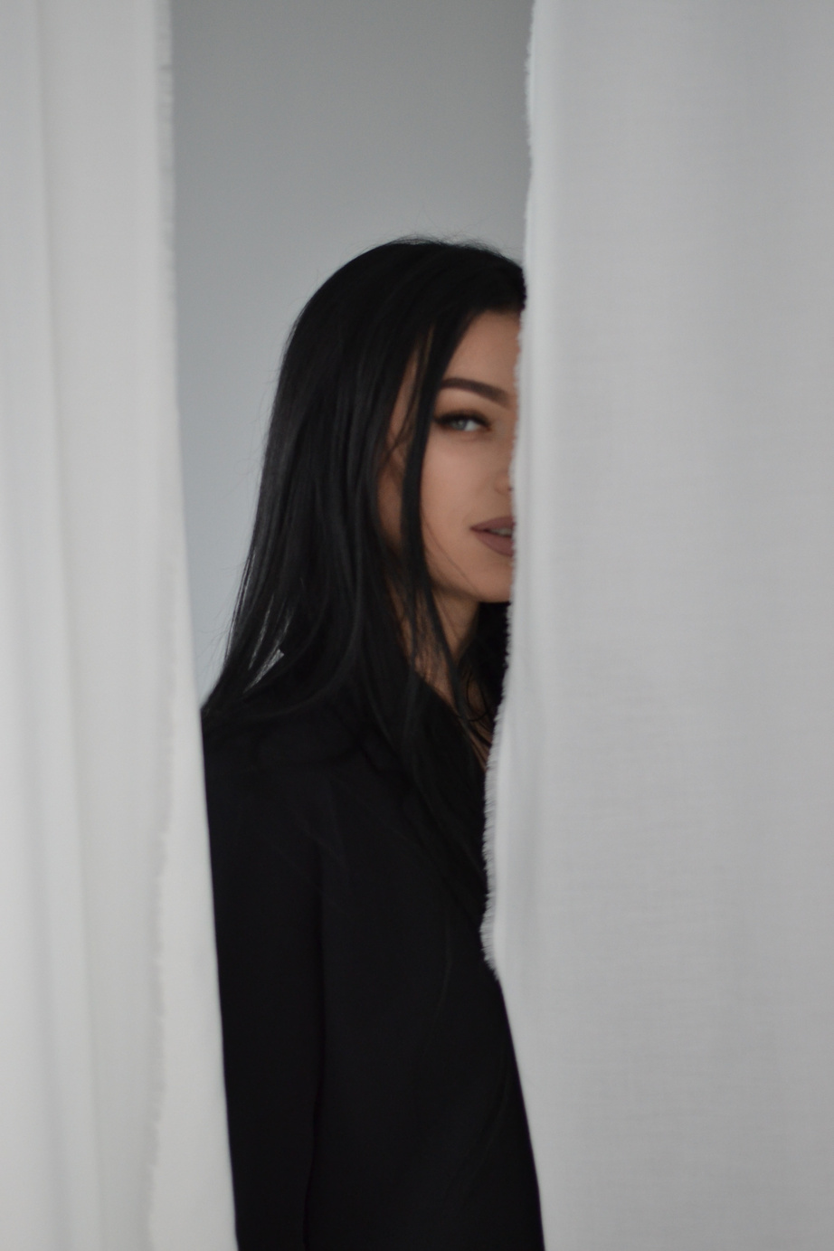 Stylish minimalistic photo of a girl in black